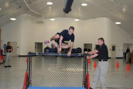 Police recruit during obstacle course