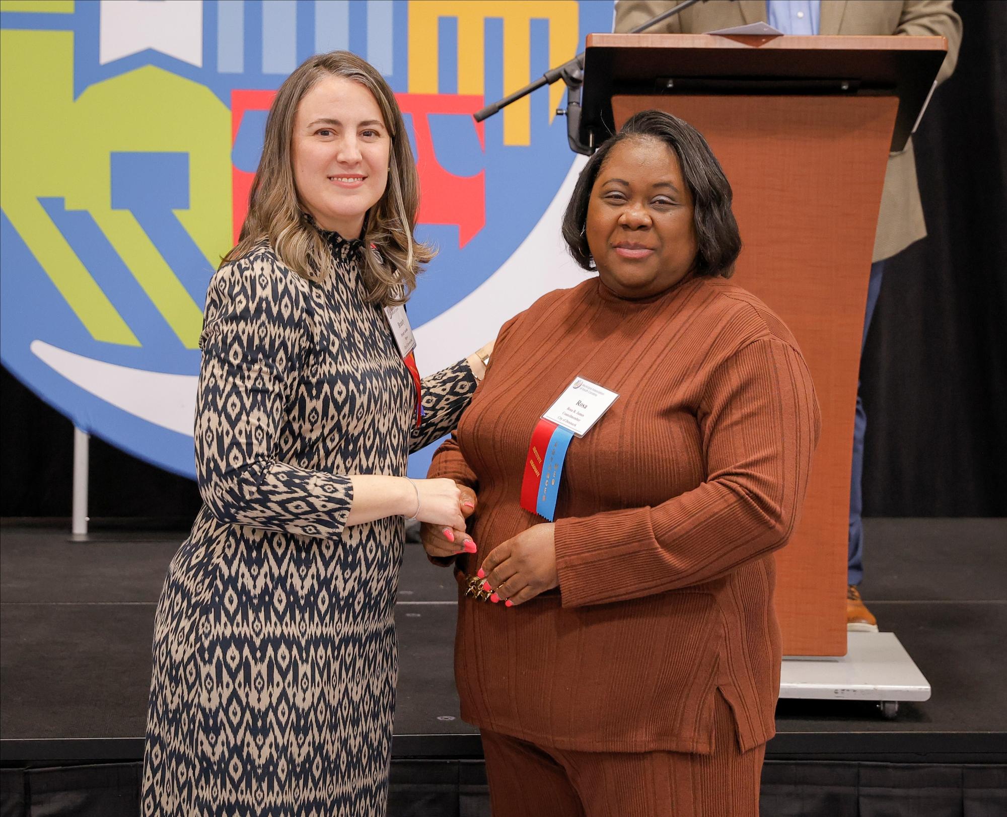 Councilmember Rosa R. James and Mayor Brandy Amidon, Municipal Association President.