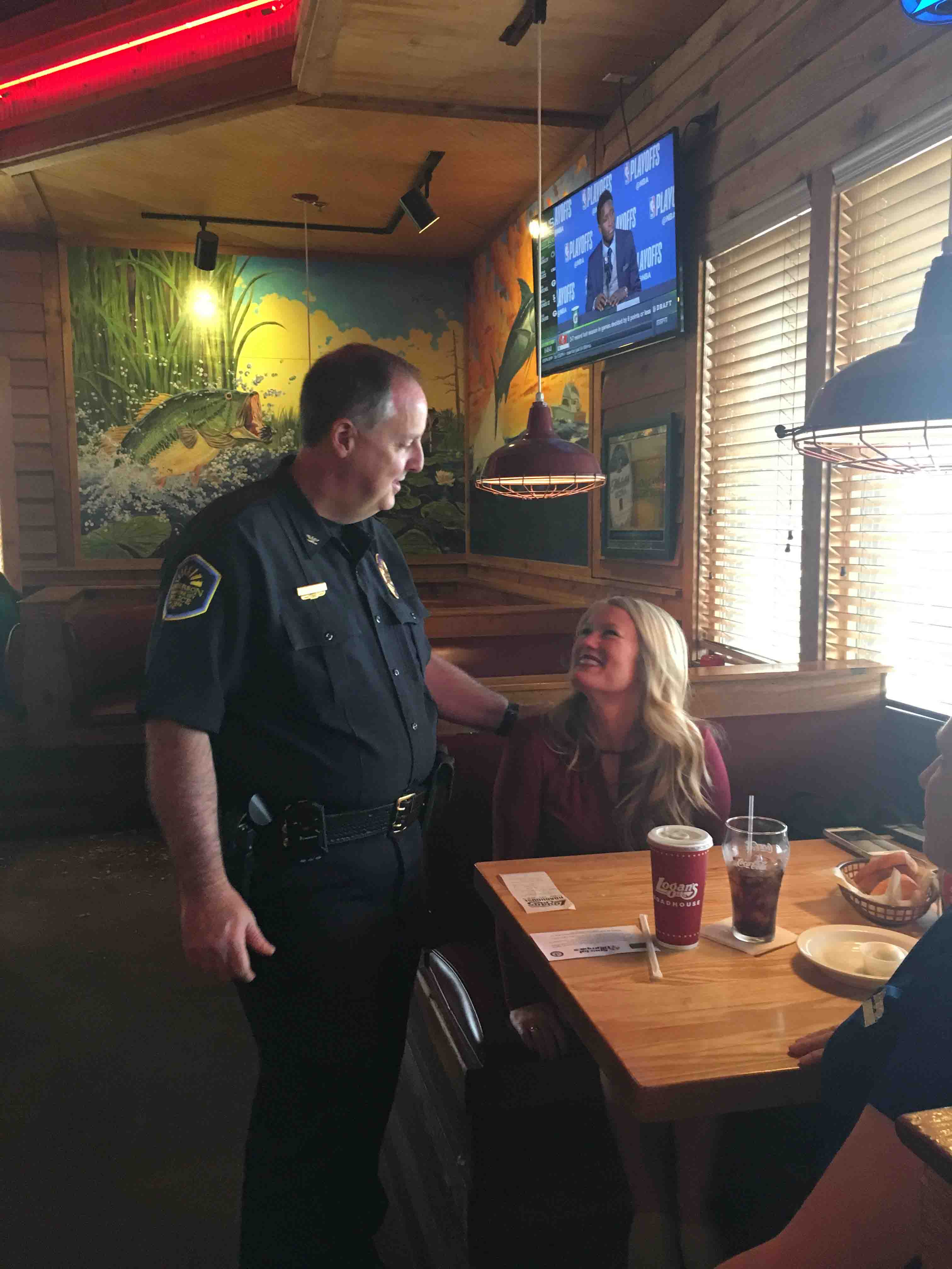 Anderson Police Chief Jim Stewart waits tables at local restaurant