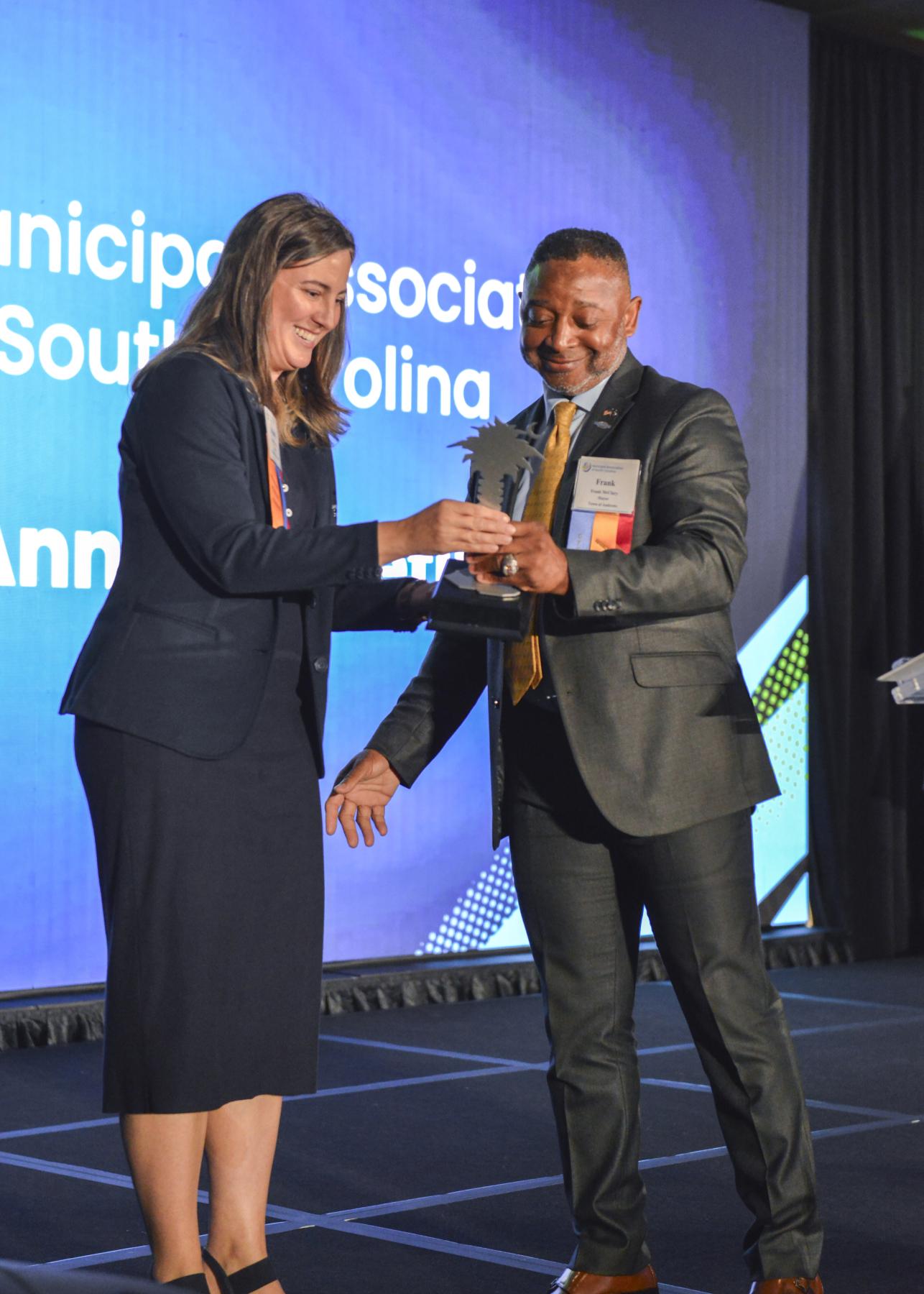 Outgoing Municipal Association president, Mayor Brandy Amidon, left; and incoming president, Mayor Frank McClary.